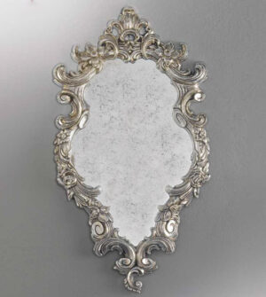 Antique mirror with a carved frame Art. M1